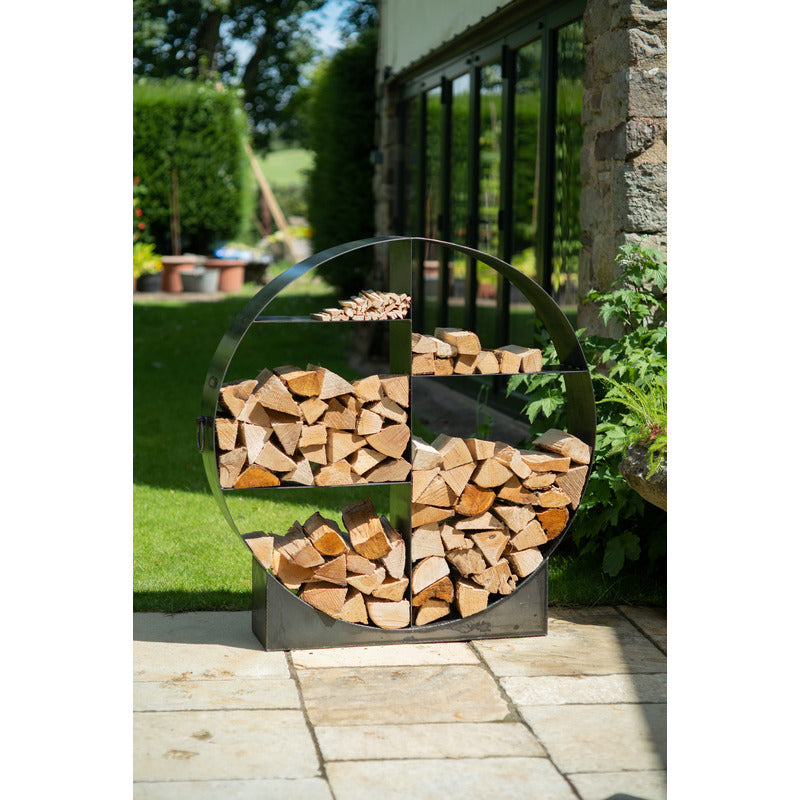 Circular Log Store Firepits UK 120cm with logs on patio