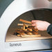 Igneus Pro 750 Wood-Fired Pizza Oven adding kindling