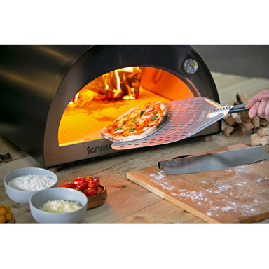 Igneus Classico Wood-Fired Pizza Oven close up with pizza cooked
