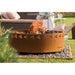 GrillSymbol Corten Steel Fire Pit Legend, ø 116 cm fire lit