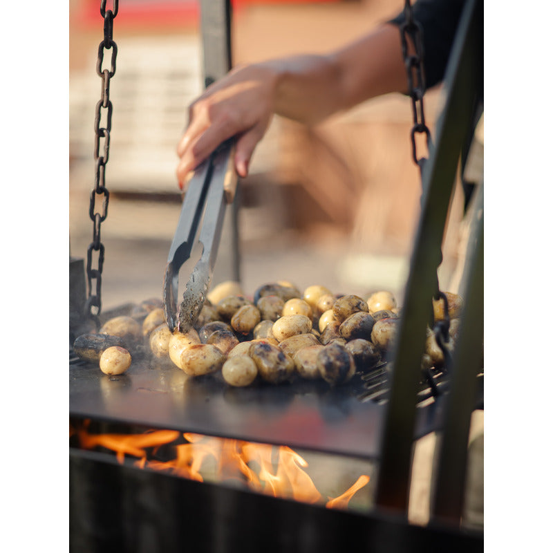 Asado Primera BBQ – The Banquet Firepits UK potatoes cooking