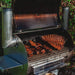 GrillSymbol BBQ Smoker Smoky Beast Silver meat cooked close up