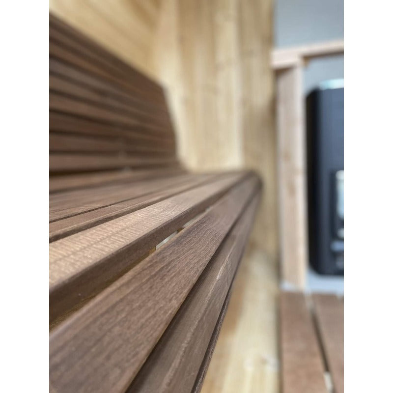 close up of alder bench in barrel sauna 