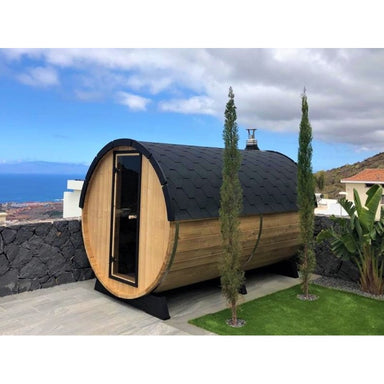 side view of barrel sauna with sea view 