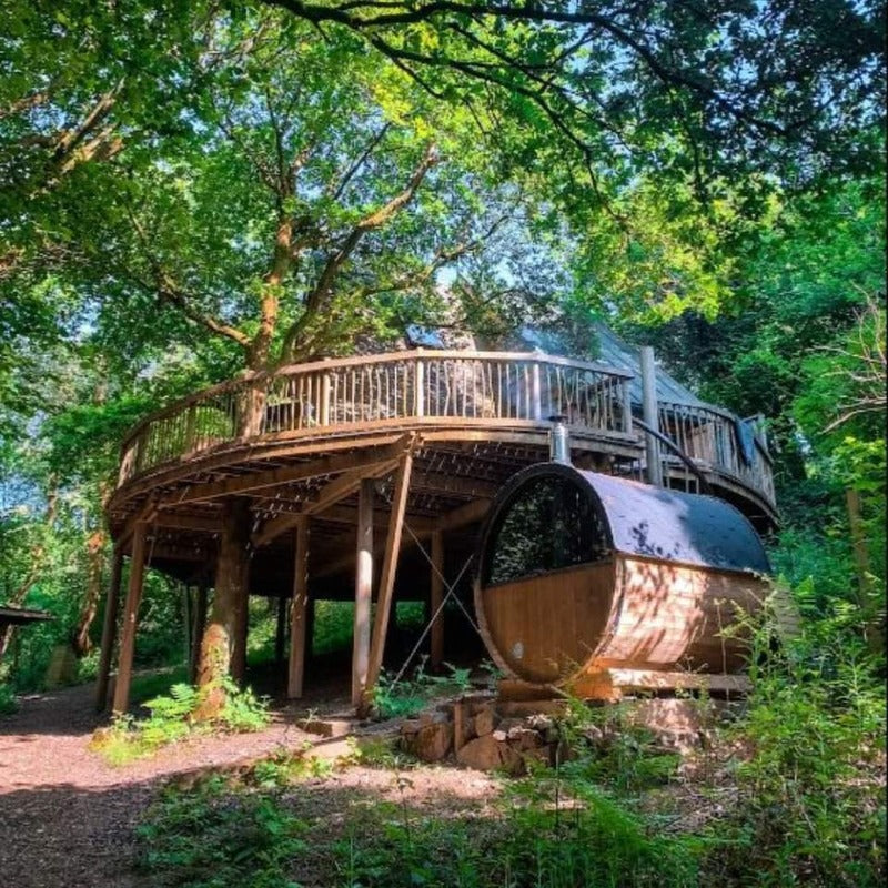 view_of_barrel_sauna_under_tree_house